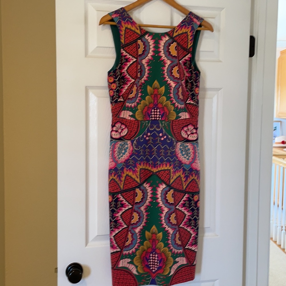 Stunning fitted dress. Side zip.
